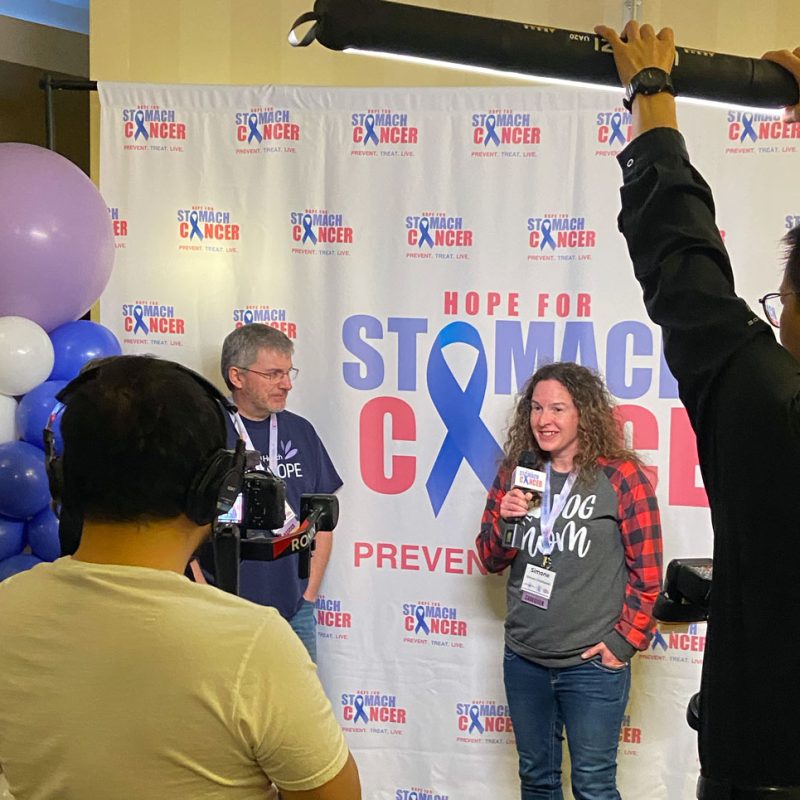 Live event video production setup in Washington DC with cameras and lighting capturing a corporate conference